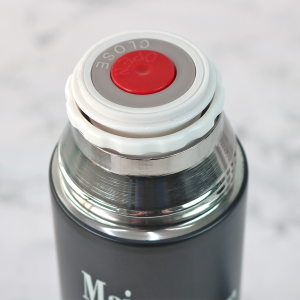 GARRAFA ISOTÉRMICA DE INOX COM FRASE E TAMPA COM COPO 450ML - GDR0085-P4